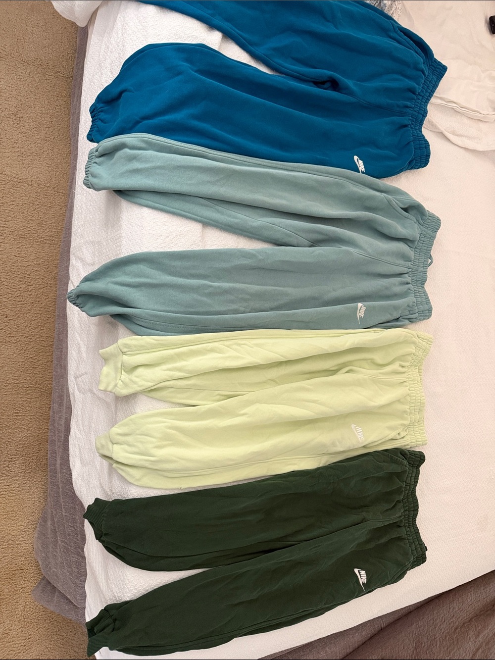 Nike Kids Jogger Bottoms in Teal, Light Teal, Lime, and Forest Green
